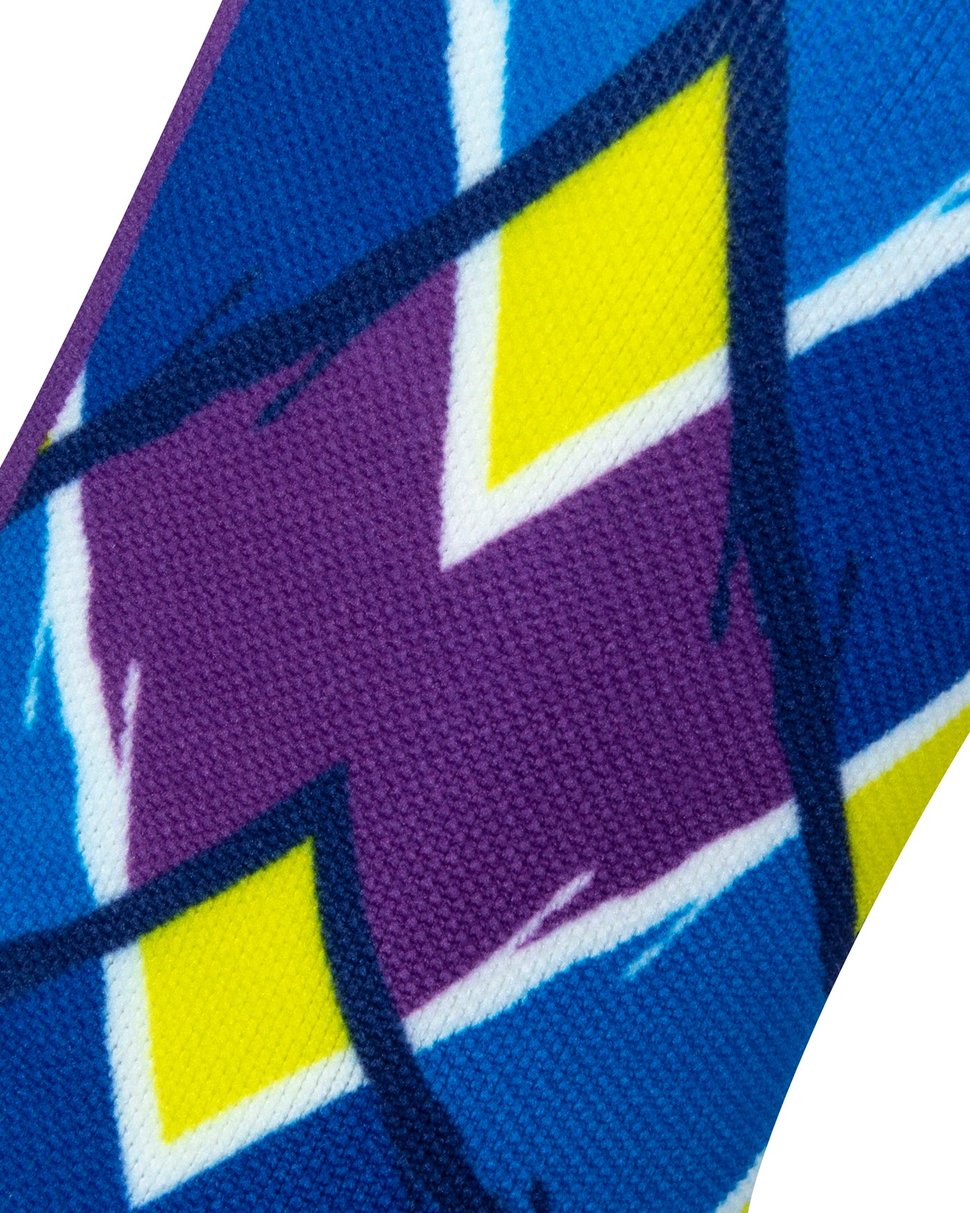 Textured view of blue seamless toe sock with blue, purple and yellow geometric print design.
