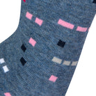 Textured view of a combed cotton blue melange seamless toe anklet with pink, grey, black and white dots.