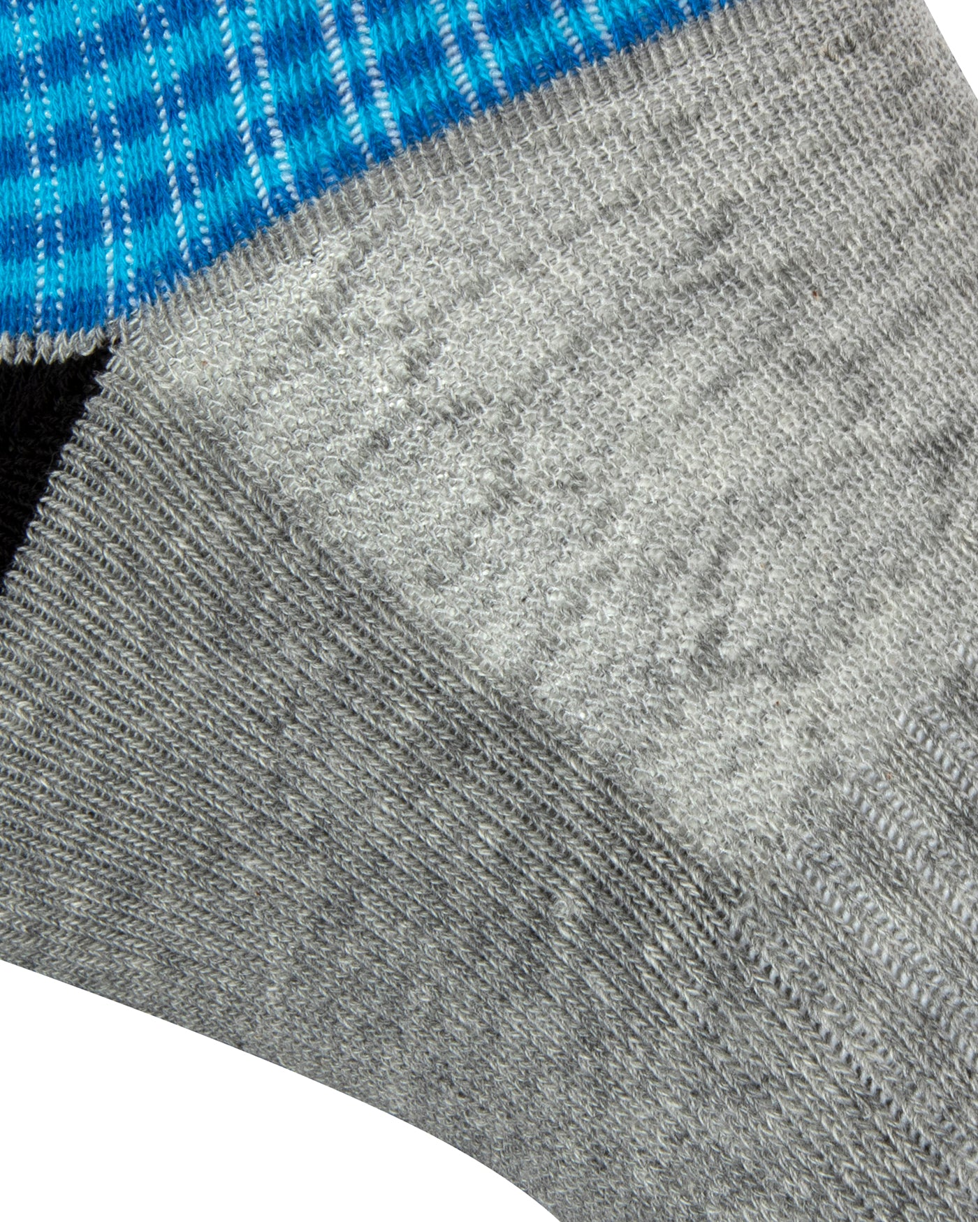 Textured heel view of a long length ribbed grey combed cotton seamless toe anklet with royal and sky blue stripes with a black heel, grey cushioned foot and gripper around the arch.
