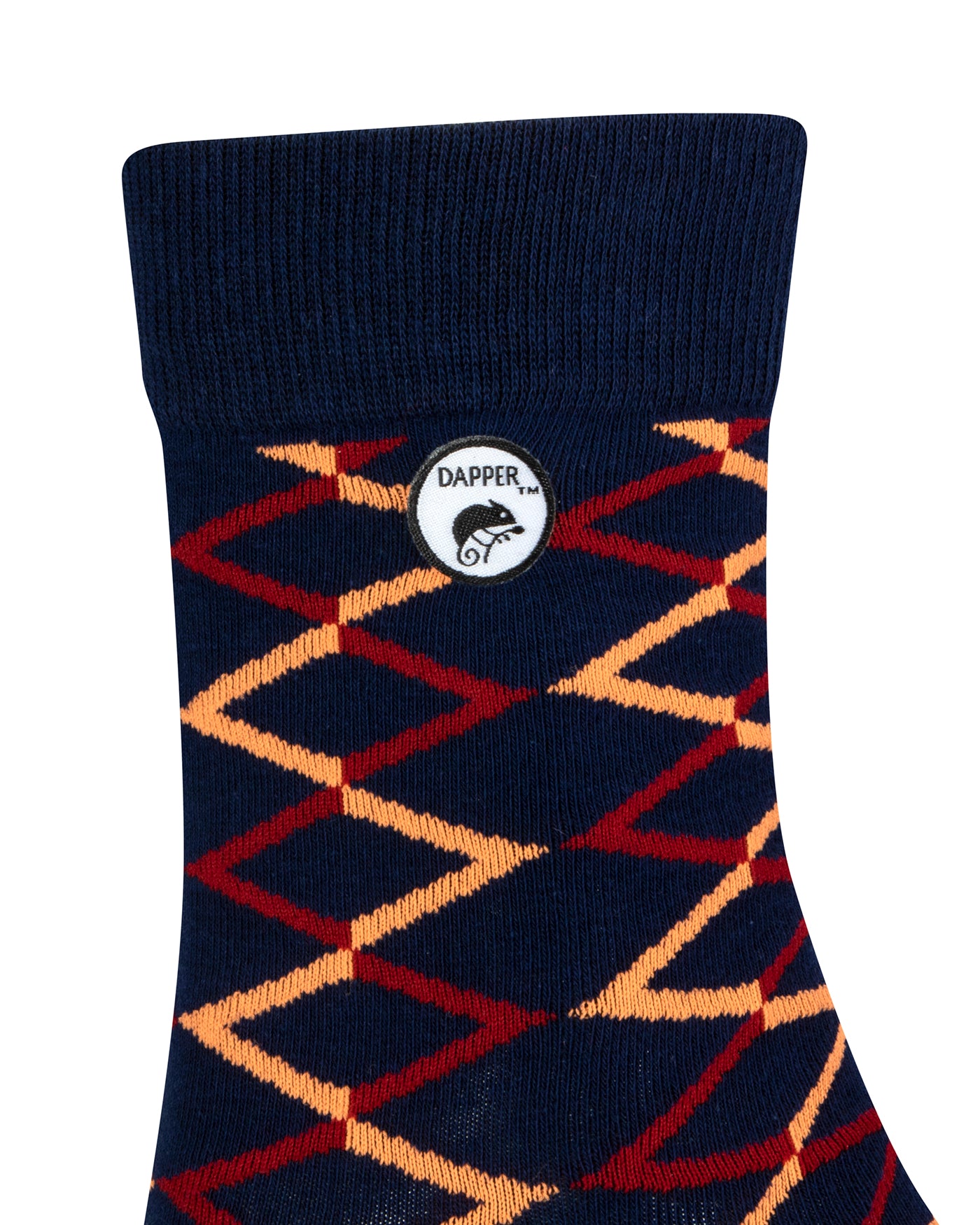 Side view of a combed cotton dark navy seamless toe anklet with a red and orange diamond shape design Dapper Chameleon logo.