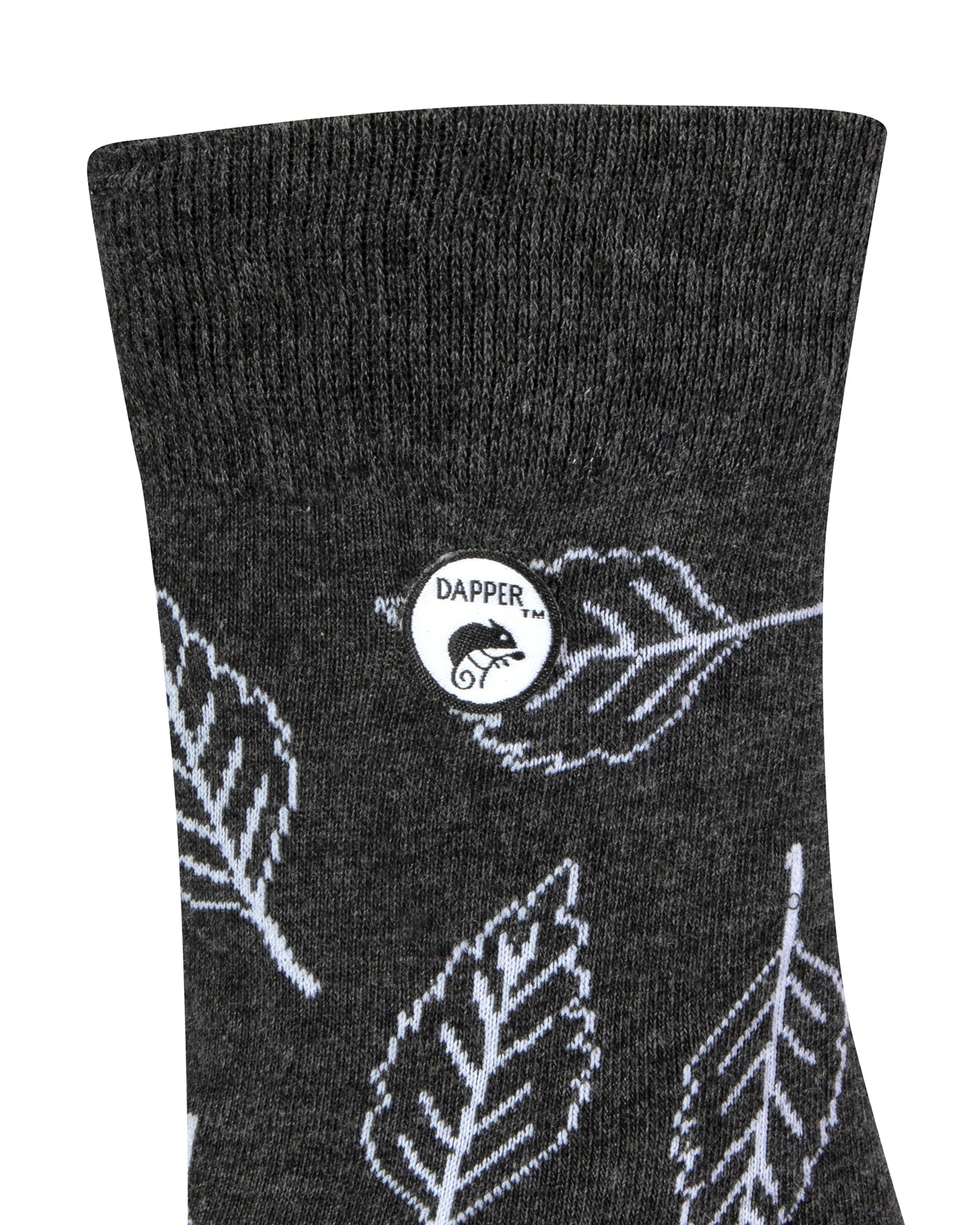 Side view of a combed cotton grey seamless toe anklet with white outlined leaves with Dapper Chameleon logo.
