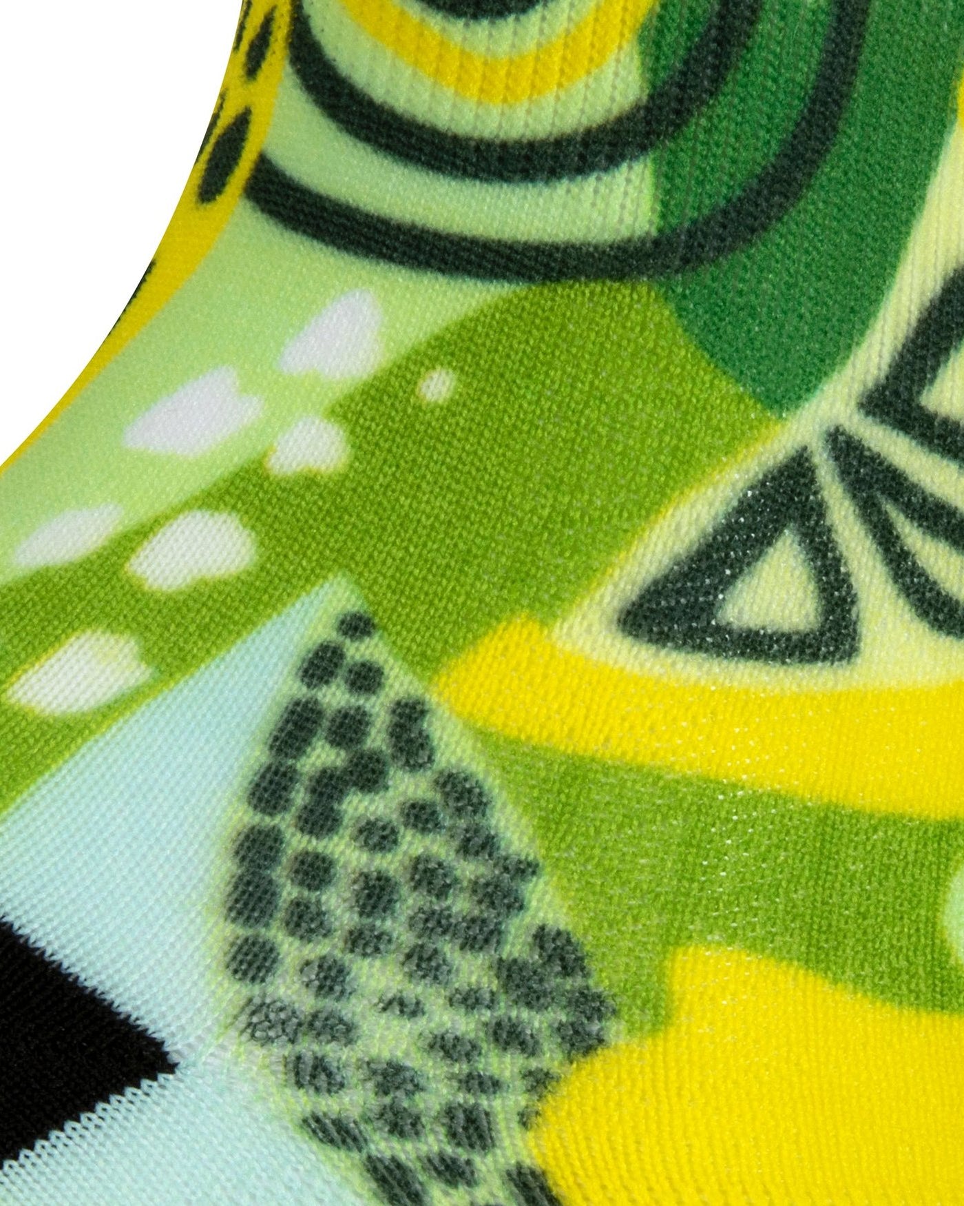 Textured heel view of seamless toe sock with multi-colour greens and yellow lemon & lime print design and black heel.