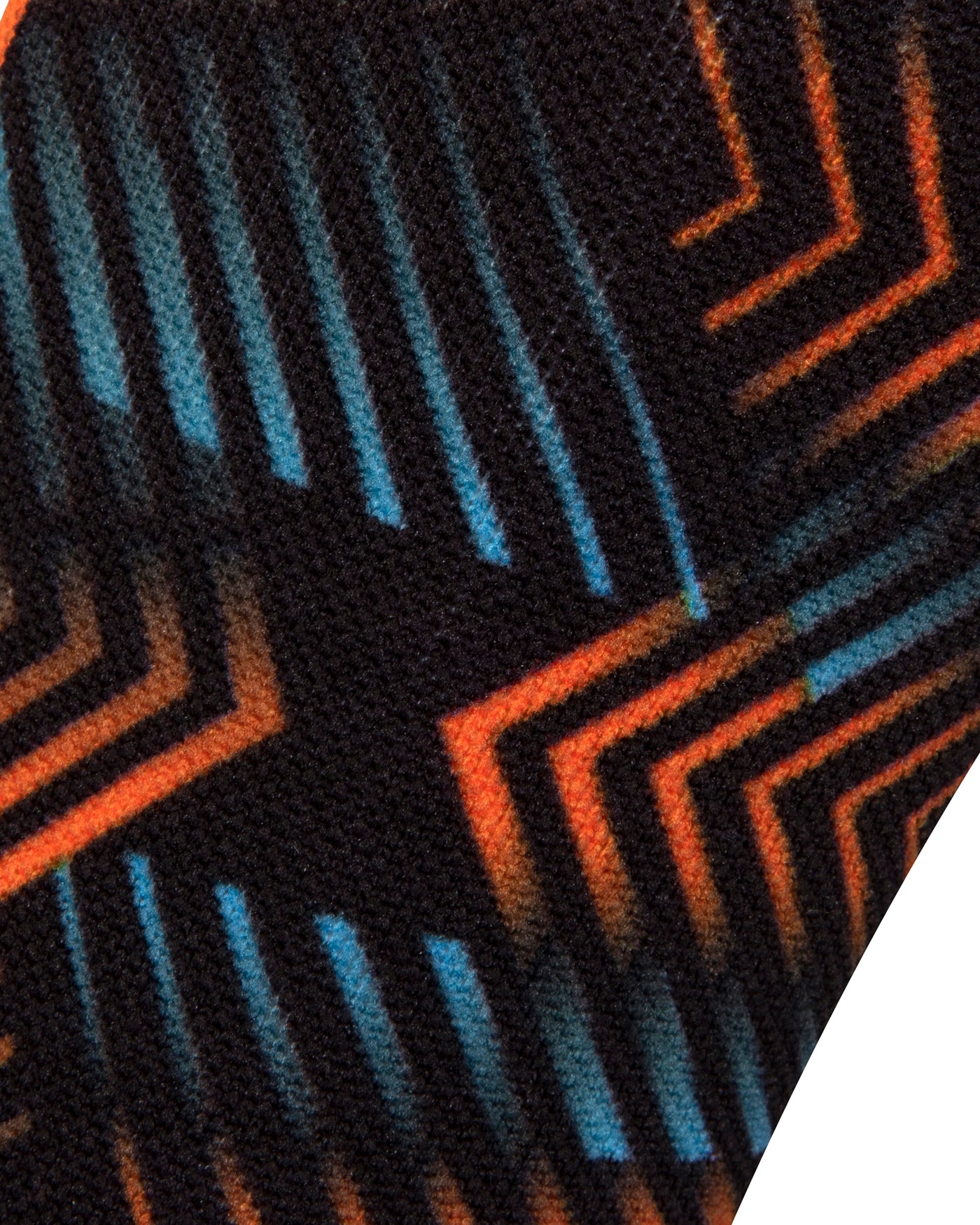 Textured view of a black seamless toe sock with orange and blue geometric print design.