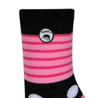 Side view of a combed cotton dark grey seamless toe anklet with cerise pink and baby pink stripes and white dots with Dapper Chameleon logo.