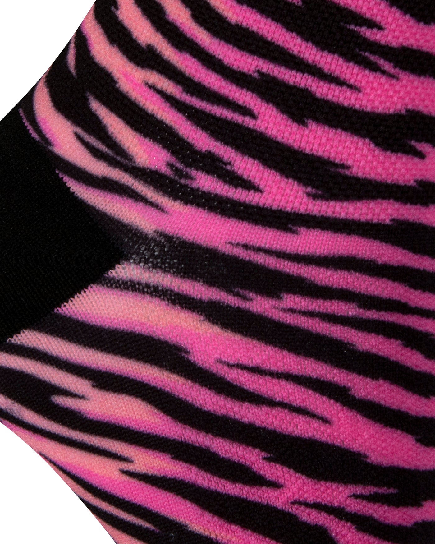 Textured heel view of a pink seamless toe sock with black zebra stripe design print and black heel.