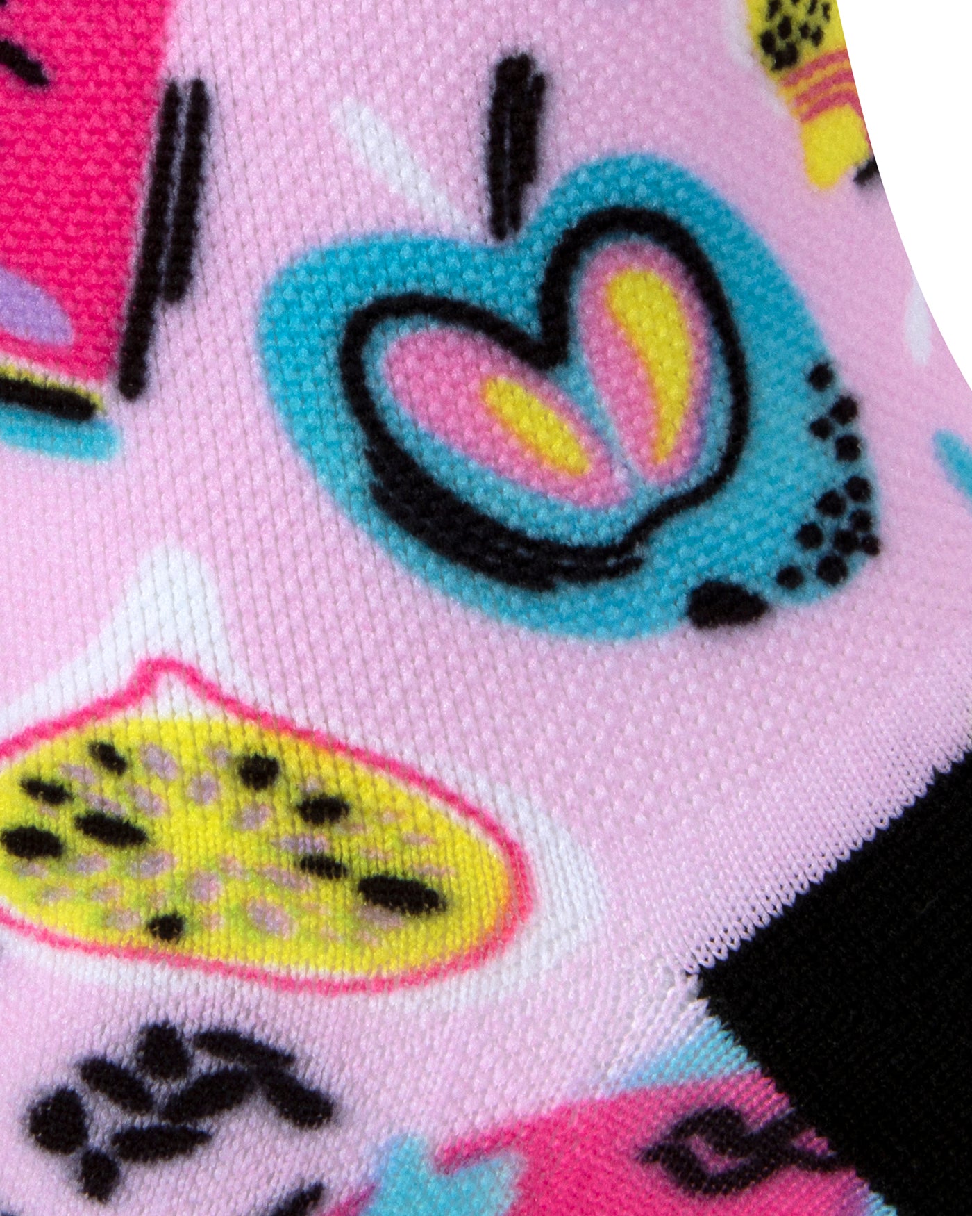 Textured heel view of a pink seamless toe sock with multi-colour fruit pop art print design and black heel.