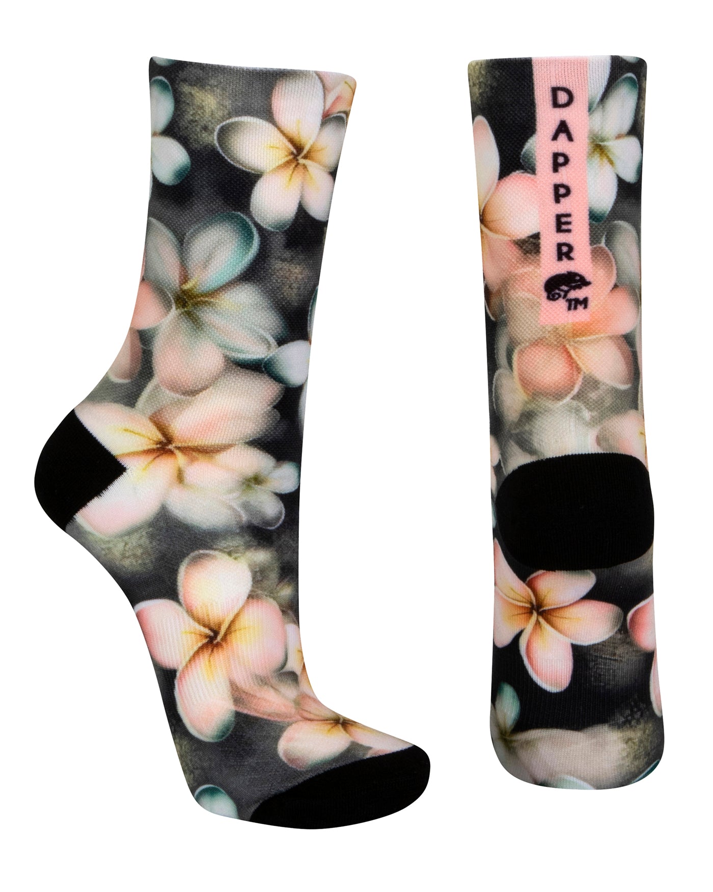 Dark grey seamless toe sock with pastel hues of white, cream, yellow, and light pink frangipani print design and black heel and toe.