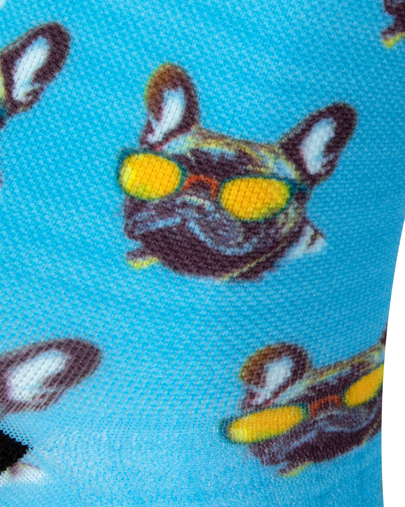 Textured heel view of a bright sky blue seamless toe sock with French bulldog wearing yellow sunglasses and black heel.