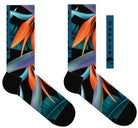 A Computer-Aided Design of the Black seamless toe sock with vibrant green and orange bird of paradise print design with a black heel and toe.