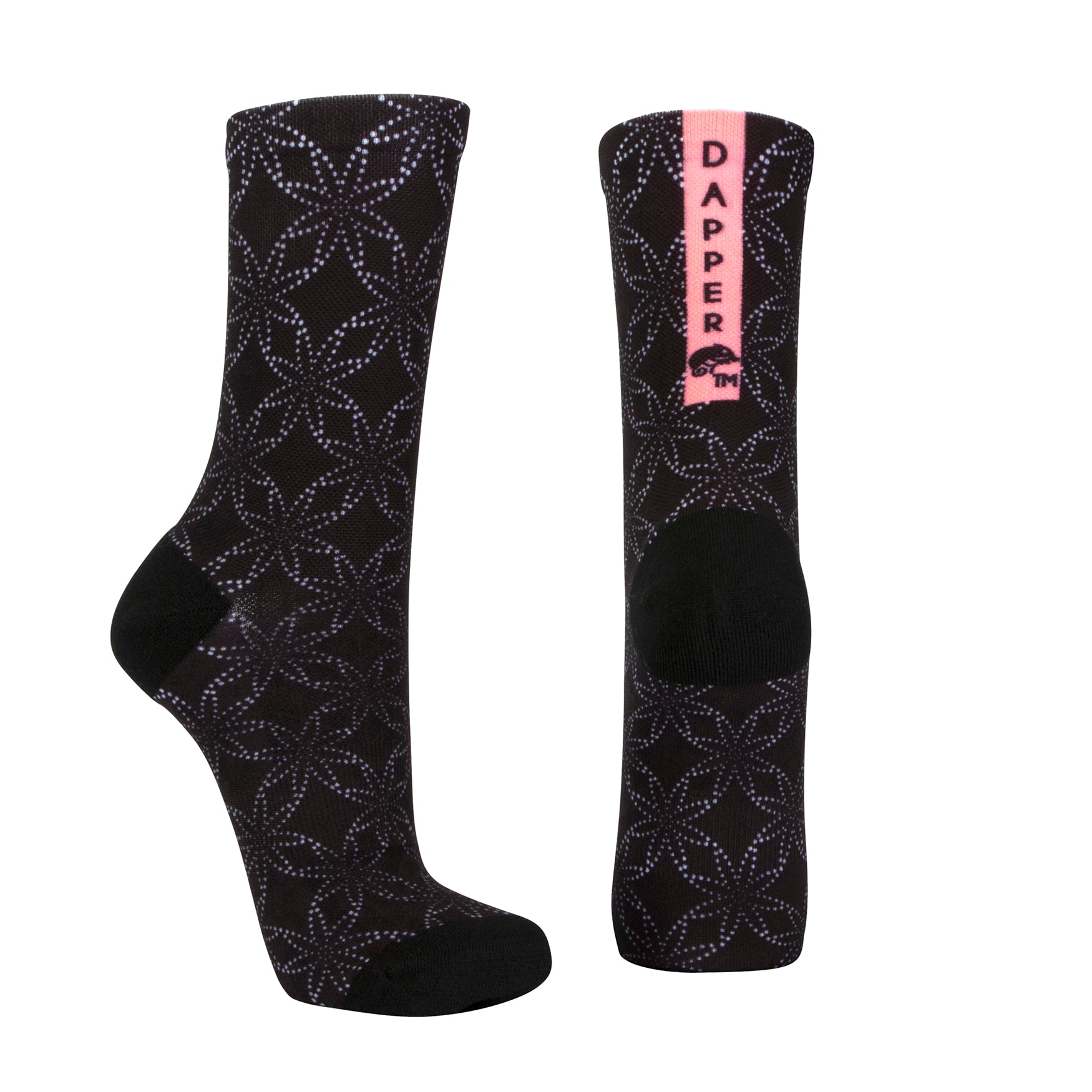 Black seamless toe sock with floral white dot print and black heel and toe.