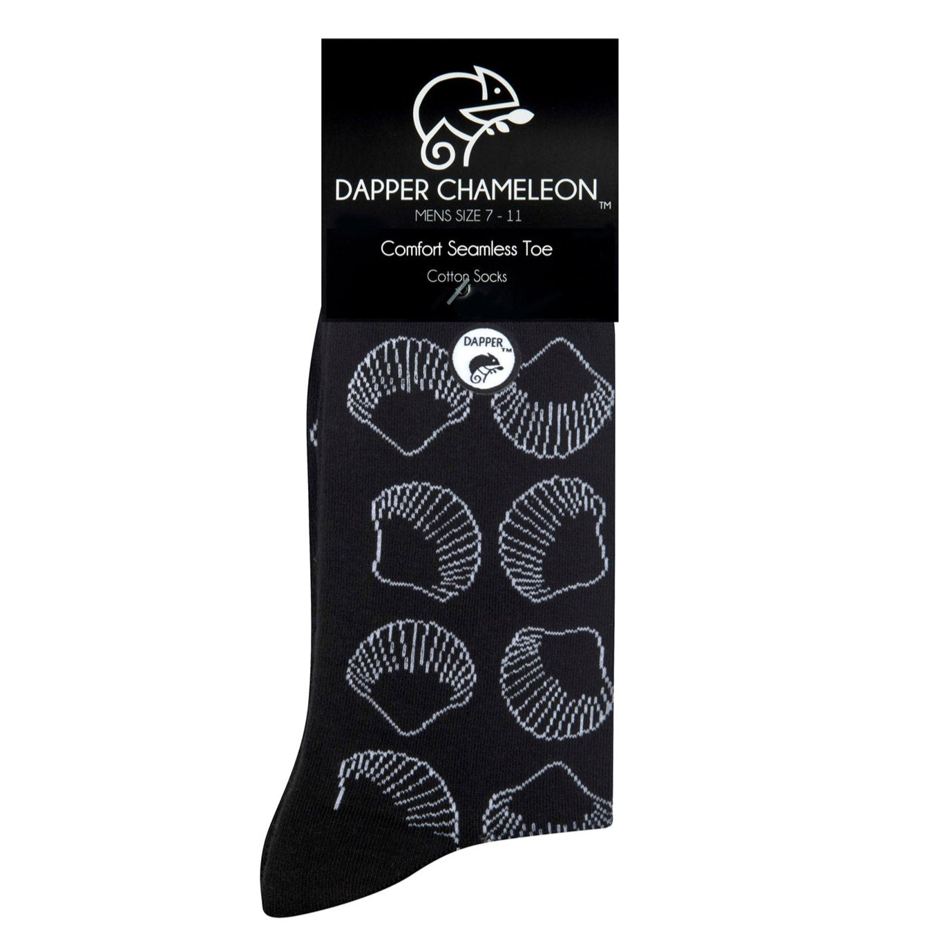 Header card packaging of a combed cotton black seamless toe anklet with white outlined sea shells with a black heel and toe.