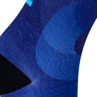 Textured heel view of blue seamless toe sock with abstract print design and black heel.