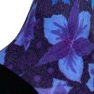 Textured heel view of blue seamless toe sock with blue and purple floral print design and black heel.