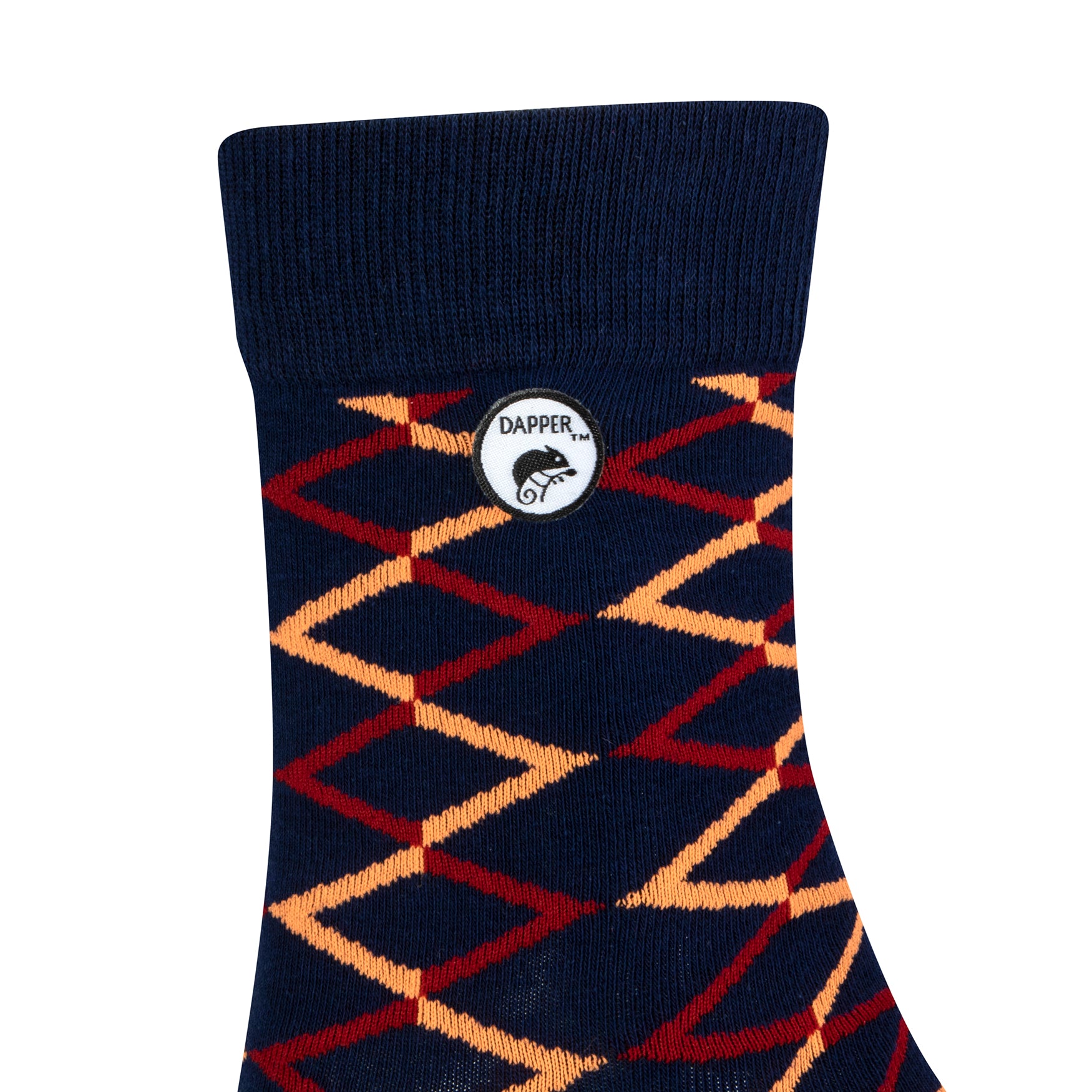 Side view of a combed cotton dark navy seamless toe anklet with a red and orange diamond shape design Dapper Chameleon logo.