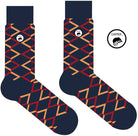 A Computer-Aided Design of a Combed cotton dark navy seamless toe anklet with a red and orange diamond shape design with a dark navy heel and toe.