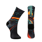 Black seamless toe sock with orange, green and red lava abstract print design and black heel and toe.