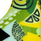 Textured heel view of seamless toe sock with multi-colour greens and yellow lemon & lime print design and black heel.