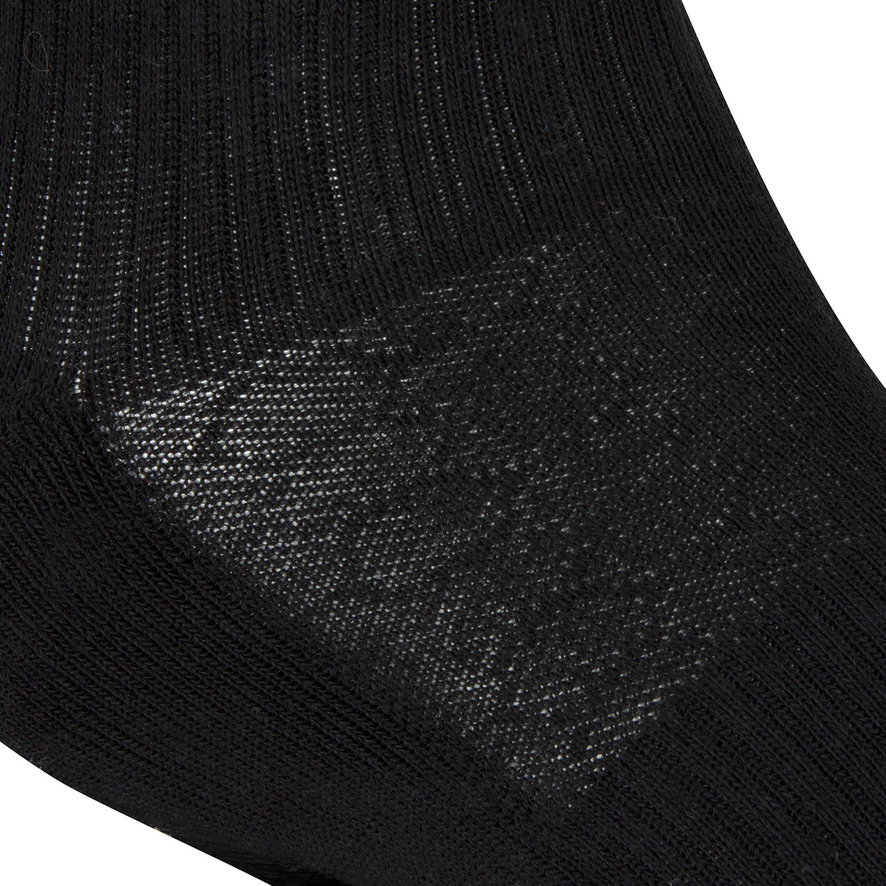 Textured view of a long length ribbed black combed cotton seamless toe anklet with cushioned foot and circular gripper around the arch of the foot.