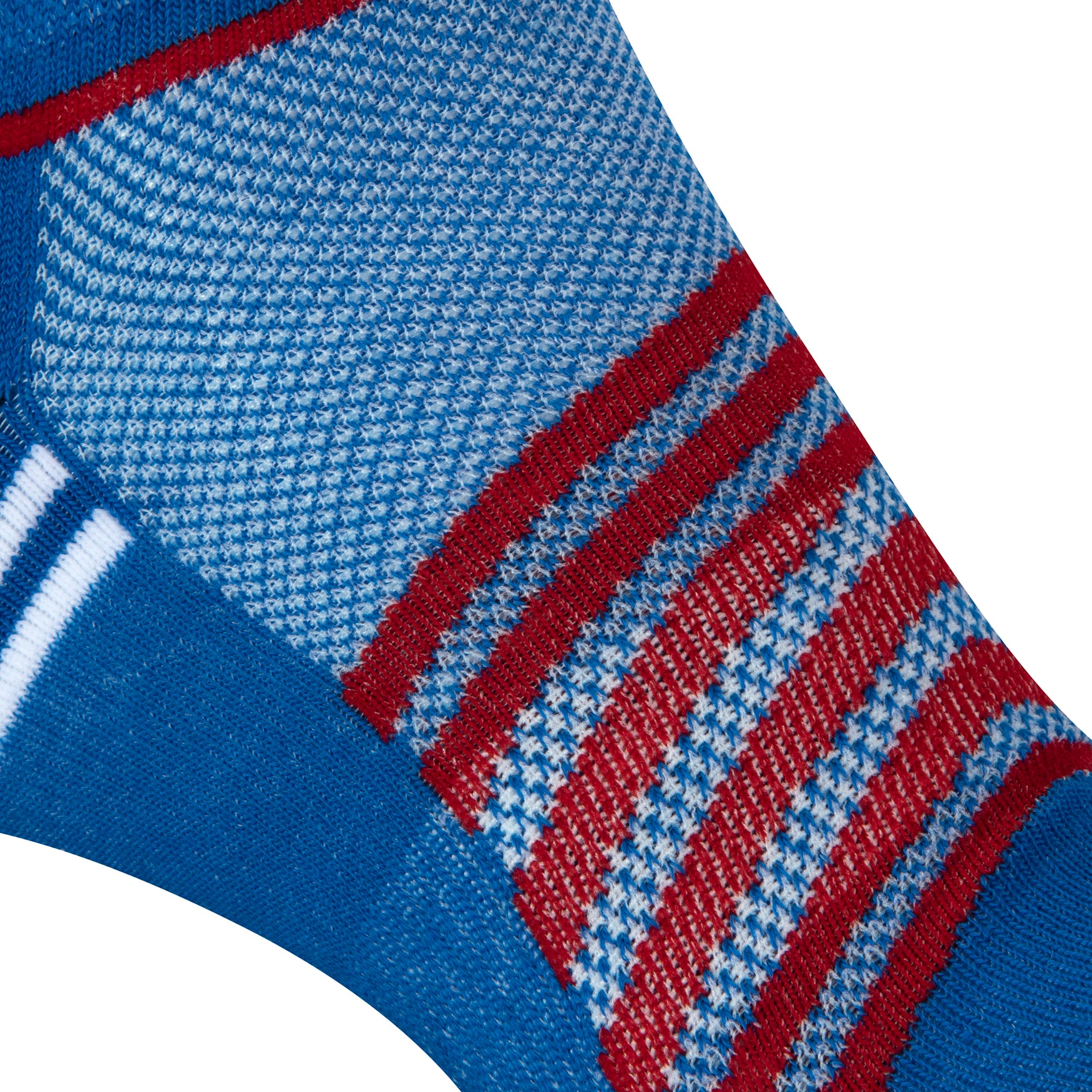 Textured view of a blue seamless toe sport sock with red and white stripes.