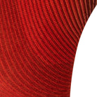 Close-up textured view of the red seamless toe sock with striped abstract print design.