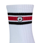 Side view of a long length ribbed white combed cotton seamless toe anklet with black and red stripes with Dapper Chameleon logo.