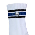 Side view of a long length ribbed white combed cotton seamless toe anklet with black and royal blue stripes with Dapper Chameleon logo.