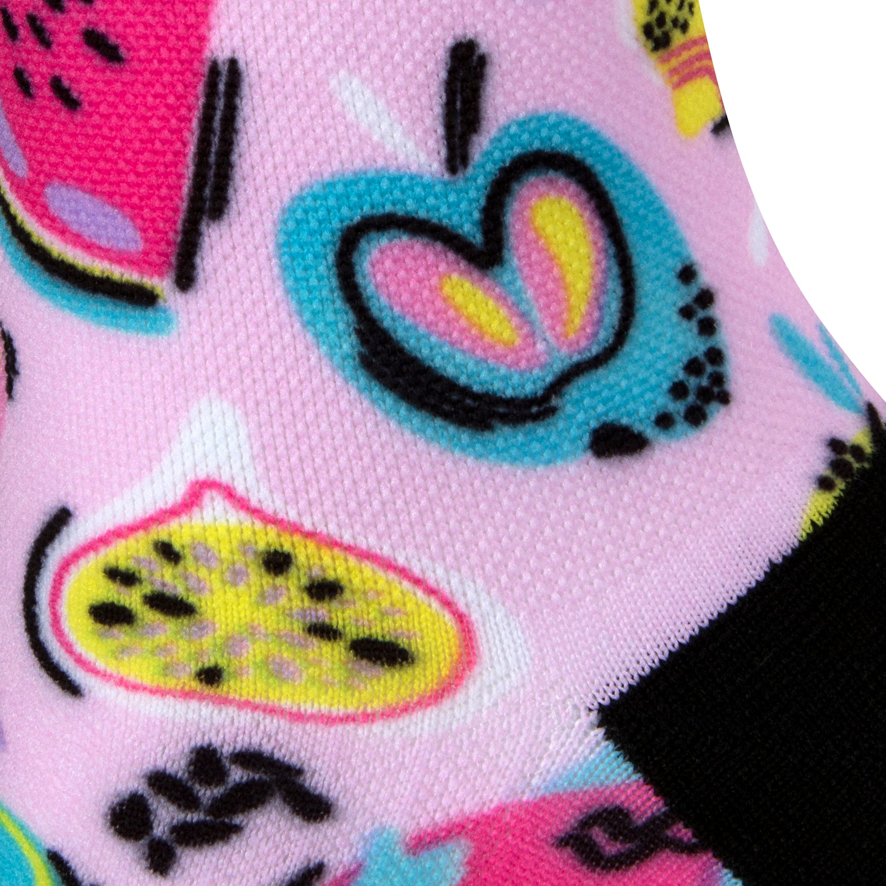 Textured heel view of a pink seamless toe sock with multi-colour fruit pop art print design and black heel.