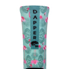 Back view of a pastel mint green seamless toe sock with pink flamingo and green tropical leaves design print and with a green strip with Dapper Chameleon wording and logo in black.