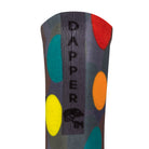 Back view of a dark grey seamless toe sock with colourful red, orange, blue, green and yellow golf balls print design and with a dark grey strip with Dapper Chameleon wording and logo in black.