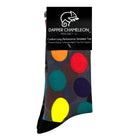 Header card packaging of a dark grey seamless toe sock with colourful red, orange, blue, green and yellow golf balls print design and black heel and toe.