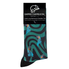 Header card packaging of a black seamless toe sock with emerald green swirls and blue and yellow parrot design print and black heel and toe.